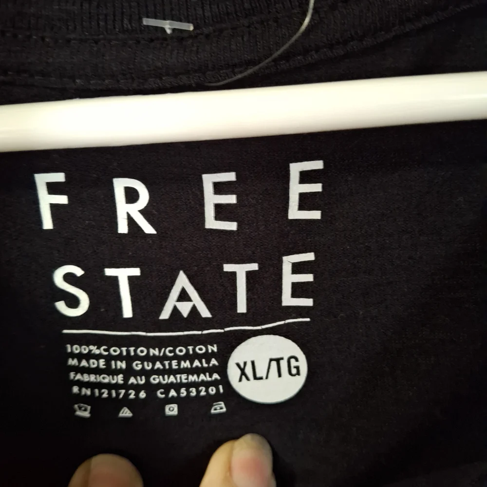 Free State Black Graphic Tee with Airplane Design